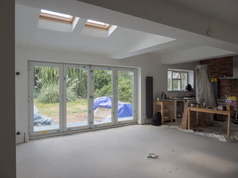 Bi-fold Doors in Newcastle upon Tyne Open-plan living space with wide glazed doors onto the garden, illustrating bi-fold doors for homes in Newcastle upon Tyne