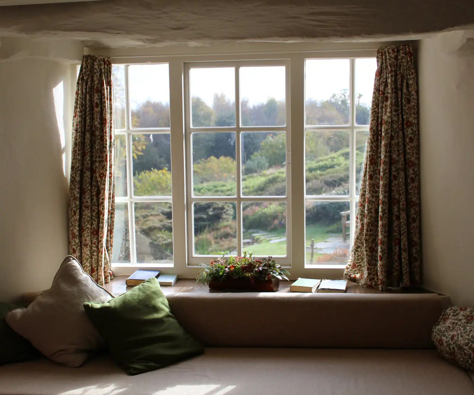 Windows and doors in Newcastle upon Tyne Living room with a large picture window looking out over green fields, illustrating windows and doors for homes in Newcastle upon Tyne